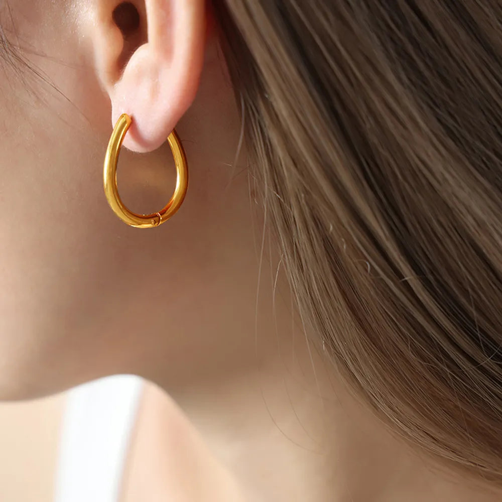 Titanium Steel Huggie Earrings - alternate earring view