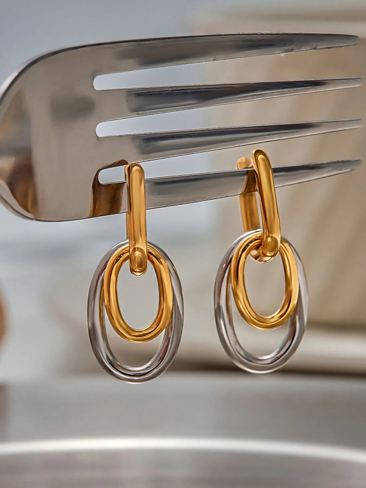 Stainless Steel Two-Tone Interlocked Hoop Earrings - alternate earring view