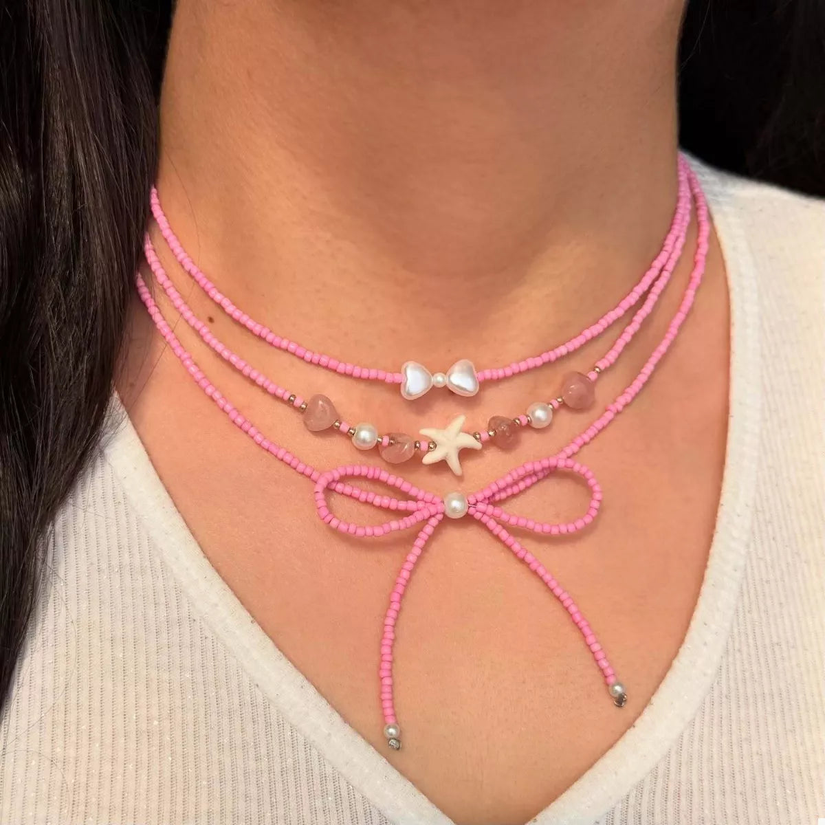 Beaded Three-Layered Necklace with Bow and Starfish Charms in Fuchsia Pink - women's layered necklace