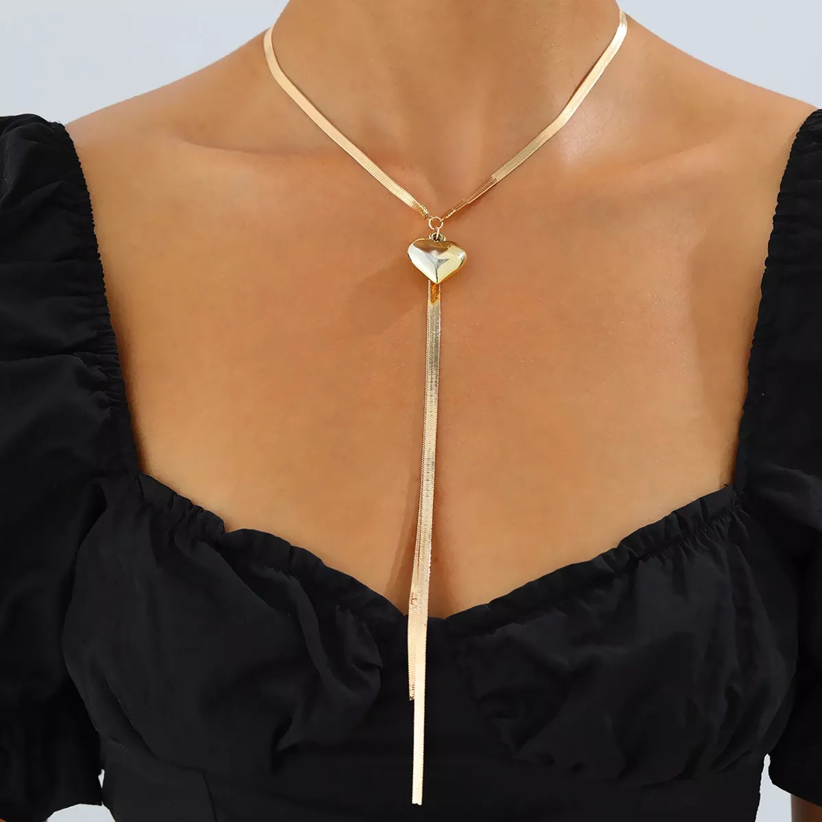 Gold-Tone Herringbone Chain Necklace with Heart Pendant Lariat Design - alternate necklace view