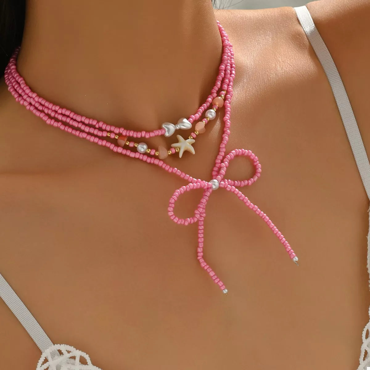 Beaded Three-Layered Necklace with Bow and Starfish Charms - alternate necklace view