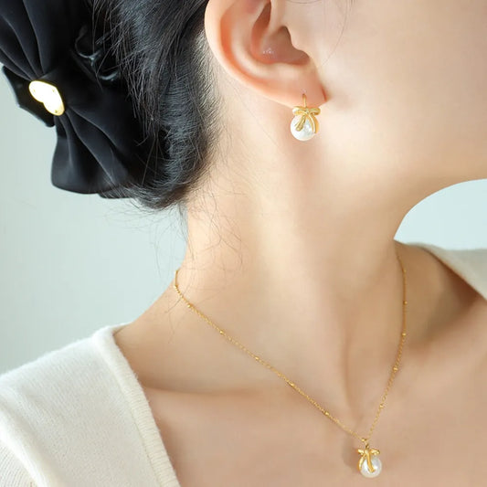 Titanium Steel Bow Drop Earrings in Gold - women's drop earrings