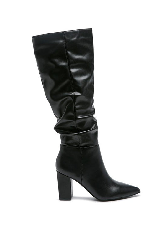 Slouch Zipper Boots crafted with durable polyurethane and synthetic lining. These knee-high boots feature a convenient side zipper opening and a solid tone slip-on design. With a block heel and pointed toe for a stylish touch, and a TPR outsole for long-lasting wear. Elevate your style to new heights with our knee-high boot slouch design. Enjoy free shipping on ALL orders. Shop now!