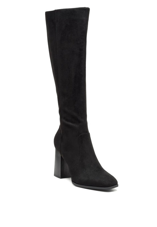 Expertly crafted Block Knee High Boots with a faux leather upper and microfiber lining for comfort and style. Featuring a square toe, block heel, and convenient zipper opening for easy wear. Made with a TPR outsole for durability and traction, these boots are perfect for any occasion. Enjoy free shipping on all orders. Shop now!