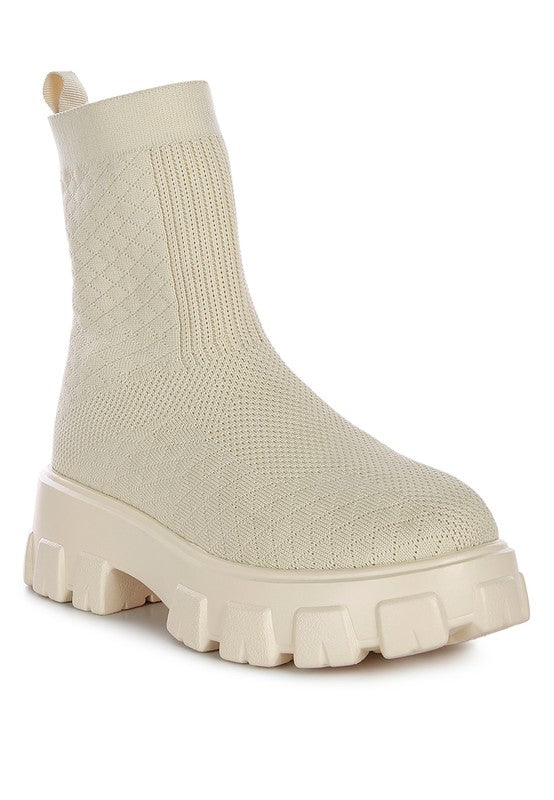 Stretch Knitted Ankle Boots expertly crafted with a knitted textile outer material and synthetic lining for both style and comfort. Featuring a closed round toe and stretch knit structure for a secure fit, while the light lug sole offers traction and a casual yet fashionable look. Enjoy free shipping on ALL orders. Shop now!