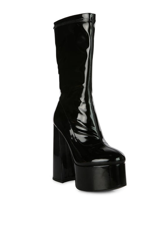 Glossy Patent Calf Boots crafted with shiny Patent PU outer material and a synthetic lining for a sleek, stylish look. Featuring a durable TPR outer sole, square toe, and block heel for comfort and stability. The side zipper opening and high heel ankle boot design make these boots perfect for any fashion-forward individual. Enjoy free shipping on ALL orders. Shop now!