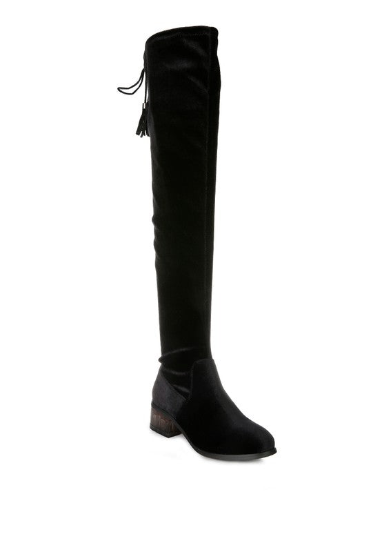Velvet Over The Knee Boots crafted from high-quality, durable materials. Featuring a tassel-detailed drawstring closure and a side zipper for easy wearing. The cut pile velvet outer material and synthetic lining add luxury, while the TPR outsole and clear block heel provide comfort and stability. Perfect for any occasion, these knee-high boots add a stylish and chic touch to any outfit. Enjoy free shipping on all orders. Shop now!