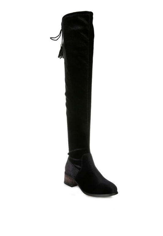 Velvet Over The Knee Boots crafted from high-quality, durable materials. Featuring a tassel-detailed drawstring closure and a side zipper for easy wearing. The cut pile velvet outer material and synthetic lining add luxury, while the TPR outsole and clear block heel provide comfort and stability. Perfect for any occasion, these knee-high boots add a stylish and chic touch to any outfit. Enjoy free shipping on all orders. Shop now!