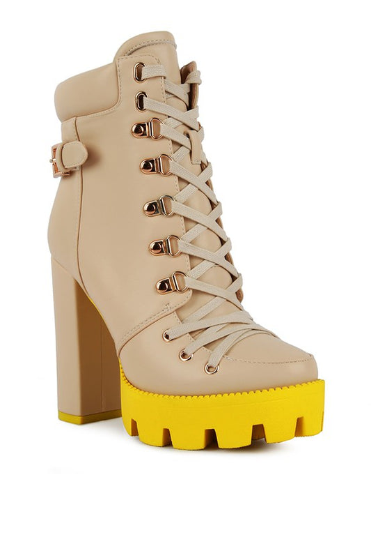 Collared Contrast Boots made with PU upper material and synthetic lining. Features block heel, pointed toe, lug sole platform, metallic buckle, eyelet detail, and lace-up design. Free shipping on all orders. Shop now!