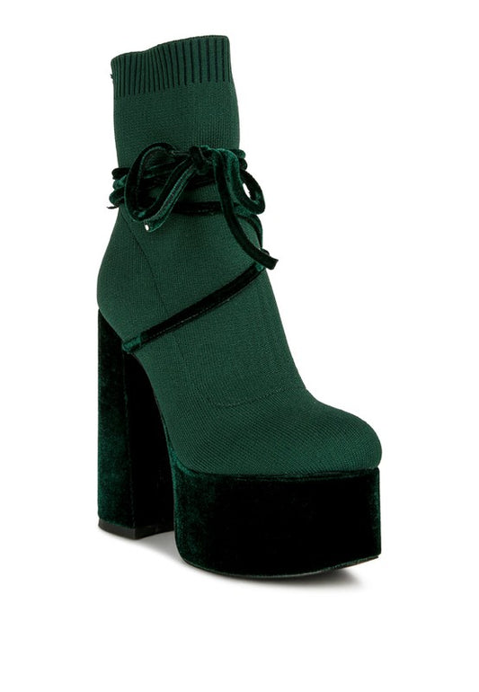 Luxuriously crafted ankle boots for women with a velvet and knitted textile outer material. Featuring a high block heel and platform for added style and comfort, these boots boast a closed toe design and tie-up closure with elegant lace-up straps for a sophisticated touch. Perfect for elevating any outfit. Enjoy free shipping on ALL orders. Shop now!