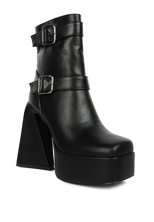 Thick Platform Boots crafted with glossy patent PU outer material and a durable TPR outer sole. Featuring a synthetic lining for comfort and a closed square toe design for a sleek look. Complete with twin buckle straps, a high platform, and a side zipper opening for easy wear. Elevate your style with these block-heeled ankle boots. Enjoy free shipping on ALL orders. Shop now!