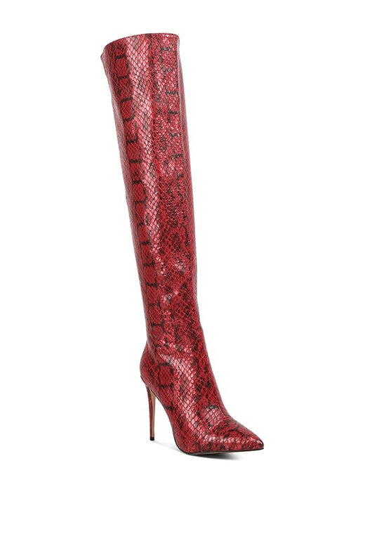 Step out in style with our Print Knee High Boots. Made with durable faux leather and TPR lining, these boots feature a stiletto heel and open pointed toe for an elegant look. The lightly padded insole ensures comfort, and the side zipper fastening offers easy wear. Perfect for any fashion-forward individual. Enjoy free shipping on all orders. Shop now!