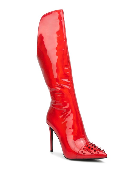 Expertly designed for ultimate style and comfort, our Spike Stiletto Calf Boots feature a sleek patent PU outer material and synthetic lining. The TPR outer sole provides durable support while the pointed toe and 4-inch stiletto heel add a touch of sophistication. With a convenient side zipper opening and golden spike studs on the toes, these boots make a bold statement. Complete with a lightly cushioned insole for all-day wearability. Enjoy free shipping on all orders. Shop now!