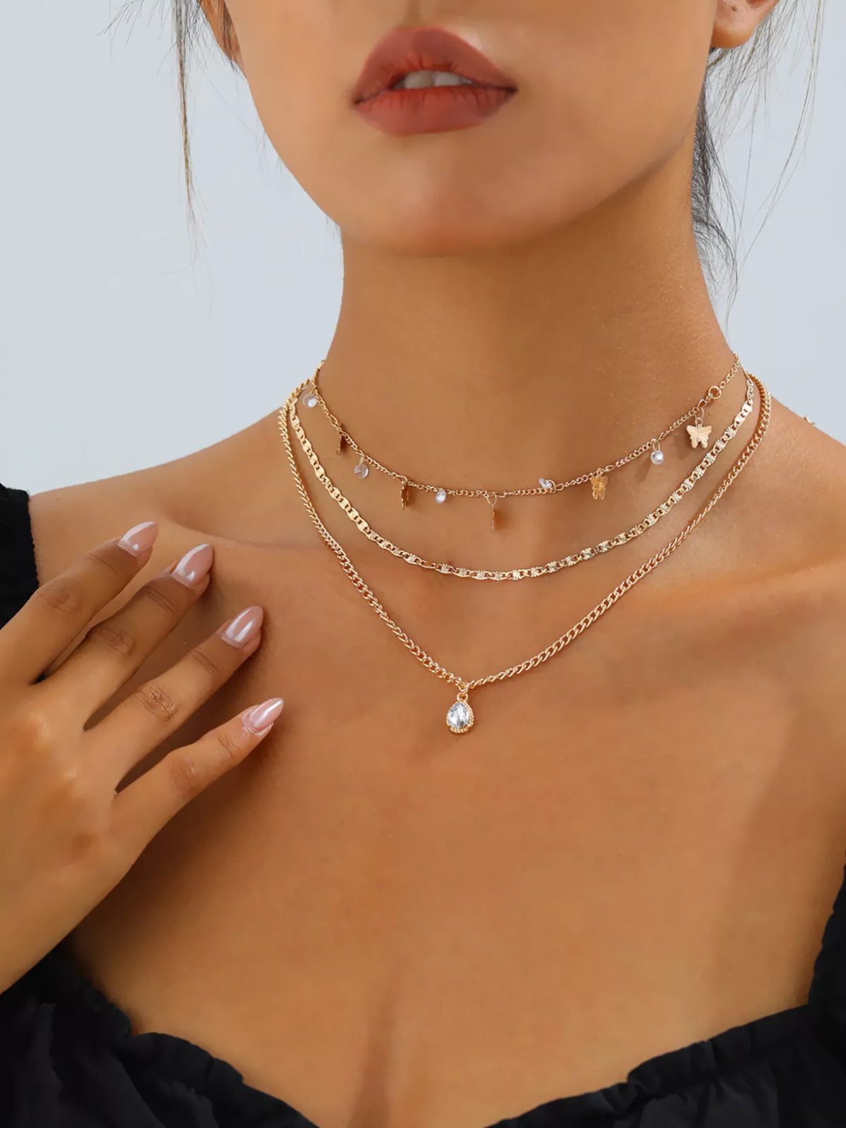 Layered Alloy Necklace with Butterfly and Zircon Charms - alternate necklace view