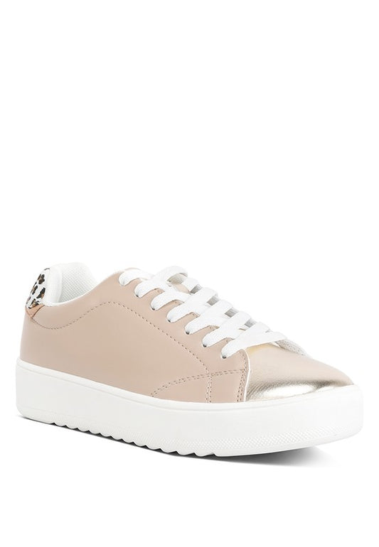 Step up your style game with these Metallic Accent Sneakers! The faux leather outer material and rubber sole provide durability for all-day wear. The printed back panel and lace-up detail add a touch of uniqueness, while lightly cushioned insoles ensure comfort. Plus, with a chunky flatform design, you'll be on-trend and elevated. Free shipping on all orders. Shop now!