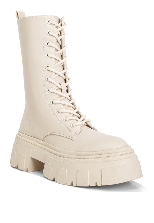 Combat Chunky Boots made with durable faux leather outer material and a TPR outer sole for long-lasting wear. Featuring a closed round toe and chunky platform heel for stability and support, with lace-up detail and side zipper closure for a secure fit. Discrete matching eyelet details and a faux leather tab add style, while the lightly cushioned insole ensures all-day comfort. Elevate your outfit with these versatile boots. Enjoy free shipping on ALL orders. Shop now!