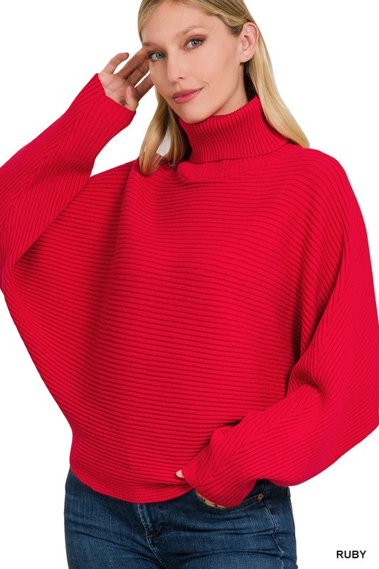 Horizontal rib-knit Turtleneck Dolman Sleeve Sweater featuring dolman long sleeves for a chic, effortless style. Hip-length design and comfortable pull-on fit, ideal for staying cozy and fashionable. Fabric: 50% Viscose, 28% Nylon, 22% Polyester. Free shipping on all orders. Shop now!