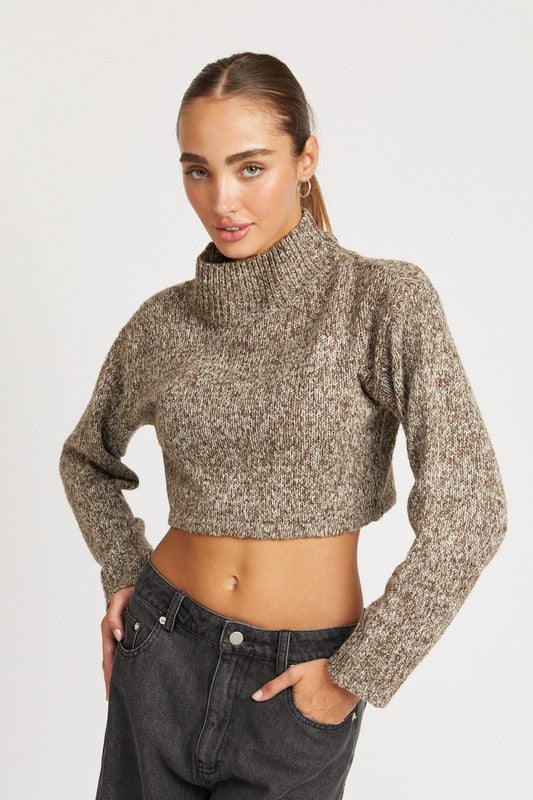Chic knitted cropped sweater featuring a straight design, high collar, and long sleeves for stylish comfort. The modern cropped hem and pull-on feature make it easy to wear, ideal for any occasion. Crafted from 100% polyester. Free shipping on all orders. Shop now!