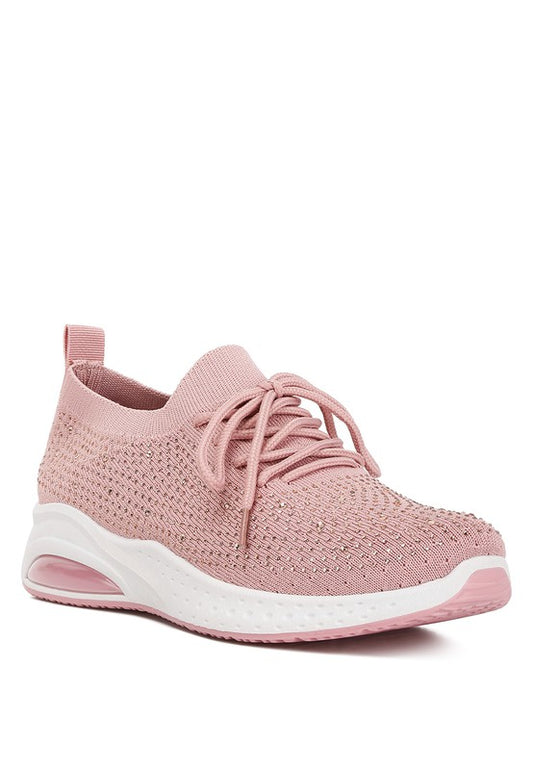 Edgy Stud Embellished Sneakers crafted with durable textile outer and rubber sole for comfort and stability. Featuring a lace-up design and pull tabs for easy wear, these sneakers are adorned with stud embellishments. Lightly cushioned insoles ensure all-day comfort. Free shipping on all orders. Shop now!