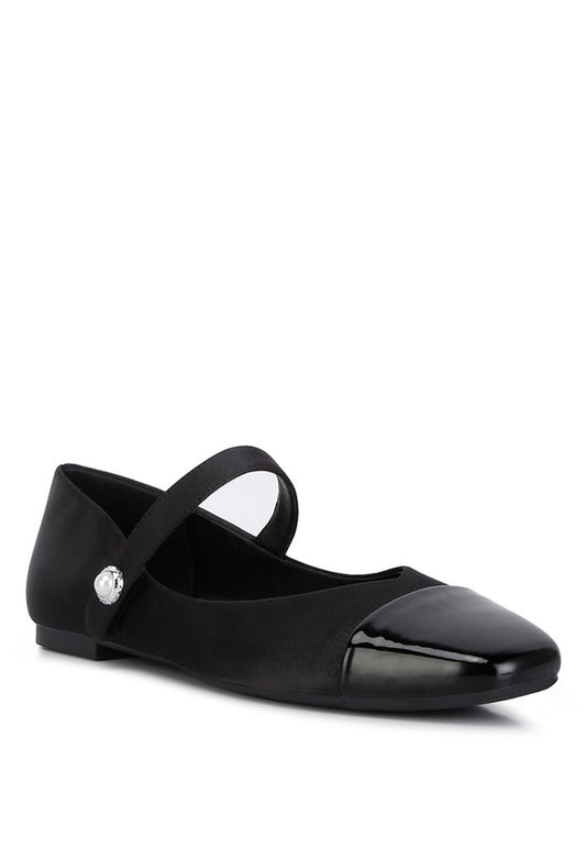 Mary Jane Flats crafted with a satin upper and TPR outer sole, featuring a closed square toe and patent toe cap for a sleek look. The light cushion insoles provide lasting comfort, and the snap button closure ensures a perfect fit. Ideal for adding elegance and practicality to any outfit. Free shipping on all orders. Shop now!