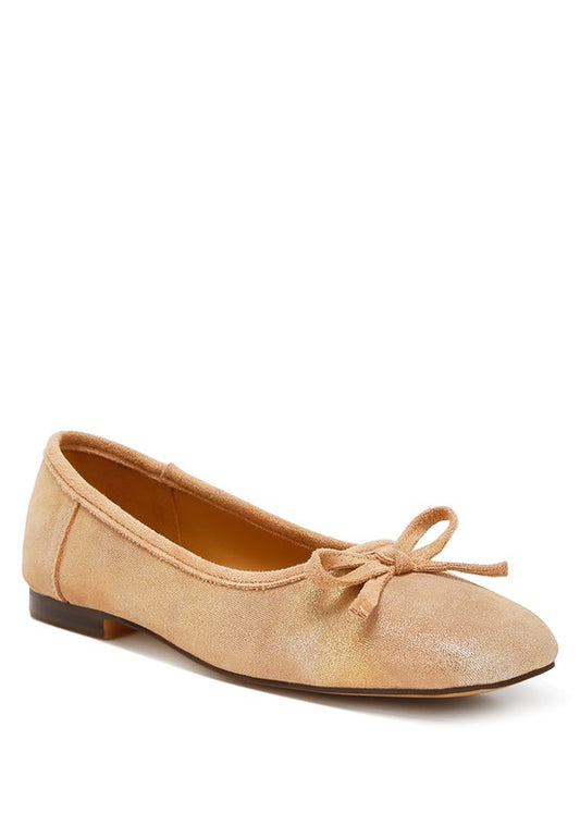 Suede Bow Embellished Ballerinas featuring soft suede material and a comfortable cushion insole for all-day support. The closed square toe and flat heels offer easy wear, while the bow embellishment adds a touch of elegance. Upgrade your shoe collection with these stylish ballerinas. Free shipping on all orders. Shop now!