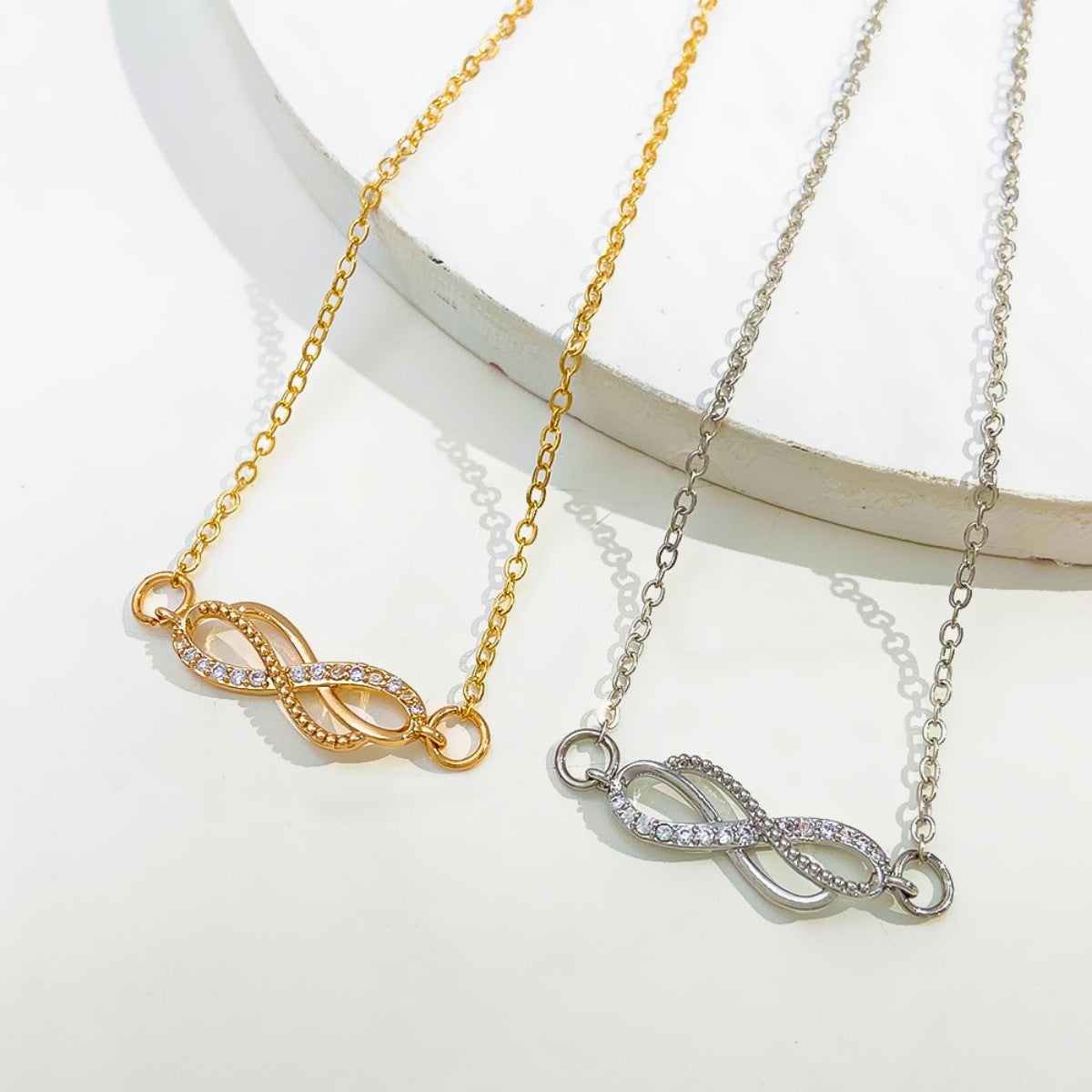 Infinity Knot Charm Bracelet in Gold - women's charm bracelet