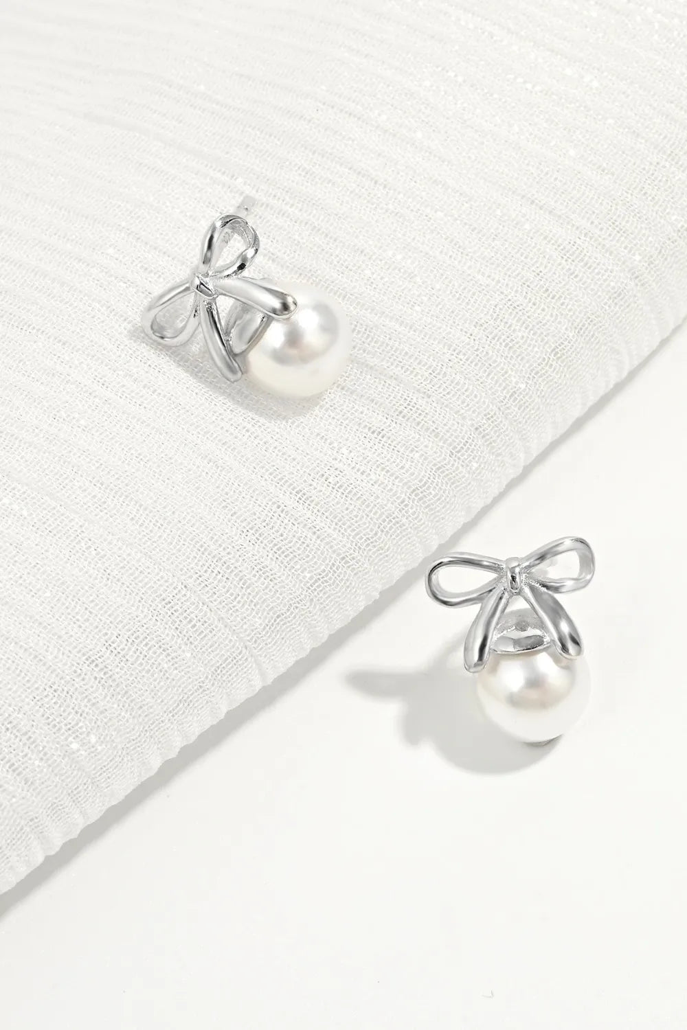 Sterling Silver Pearl Bow Earrings - alternate earring view