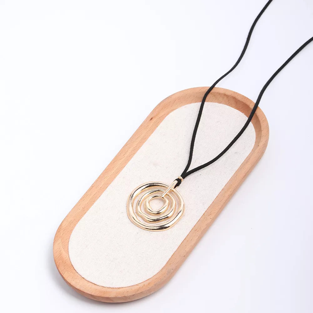 Minimalist Geometric Gold-Tone Pendant Long Necklace with Black Cord - alternate necklace view