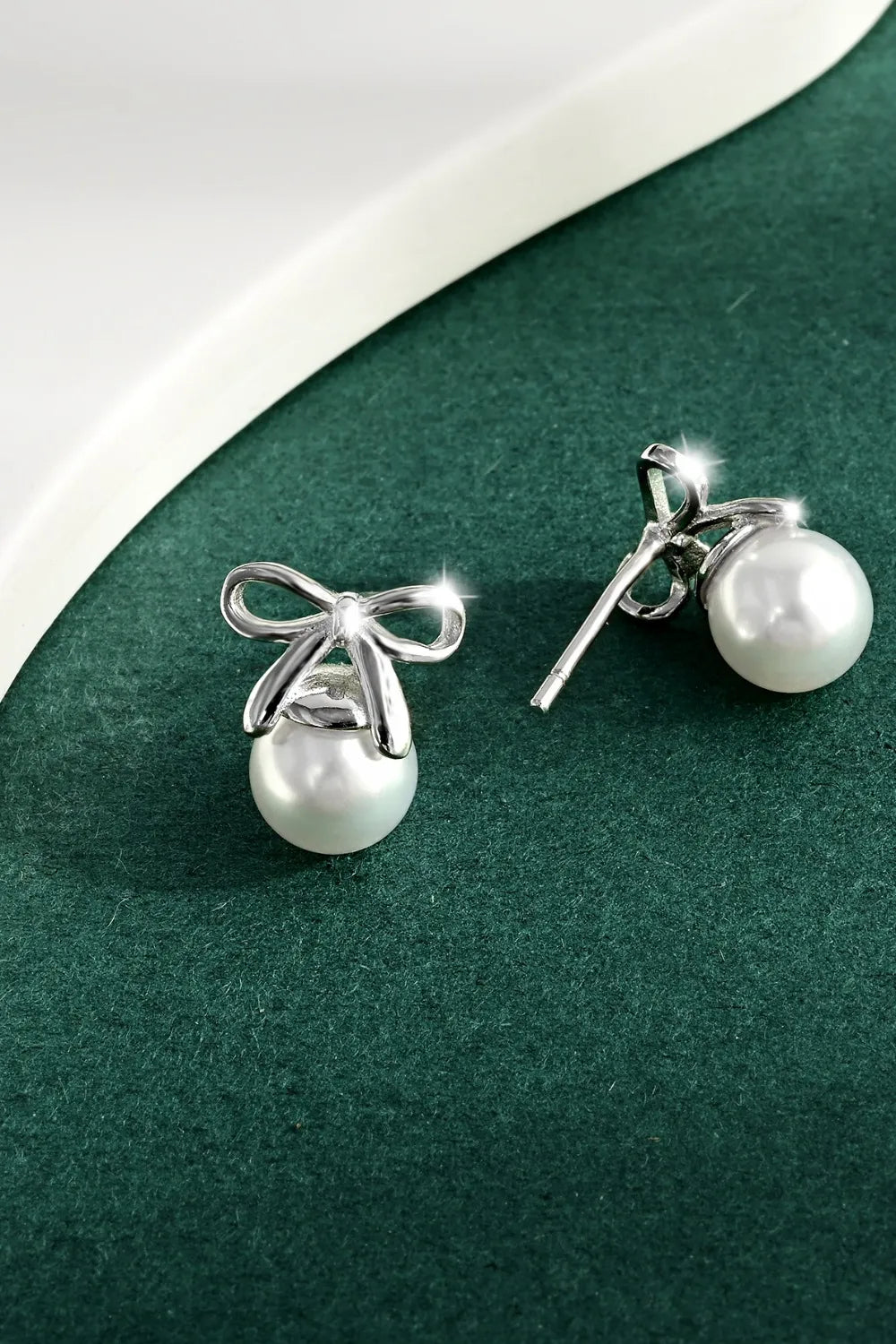 Sterling Silver Pearl Bow Earrings in Silver - women's earrings