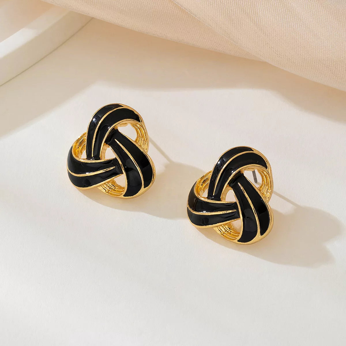 Twisted Knot Geometric Stud Earrings - alternate earring view