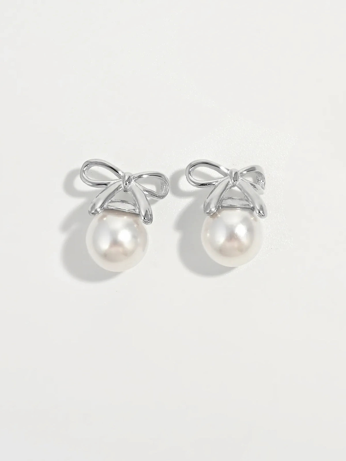 Sterling Silver Pearl Bow Earrings - alternate earring view