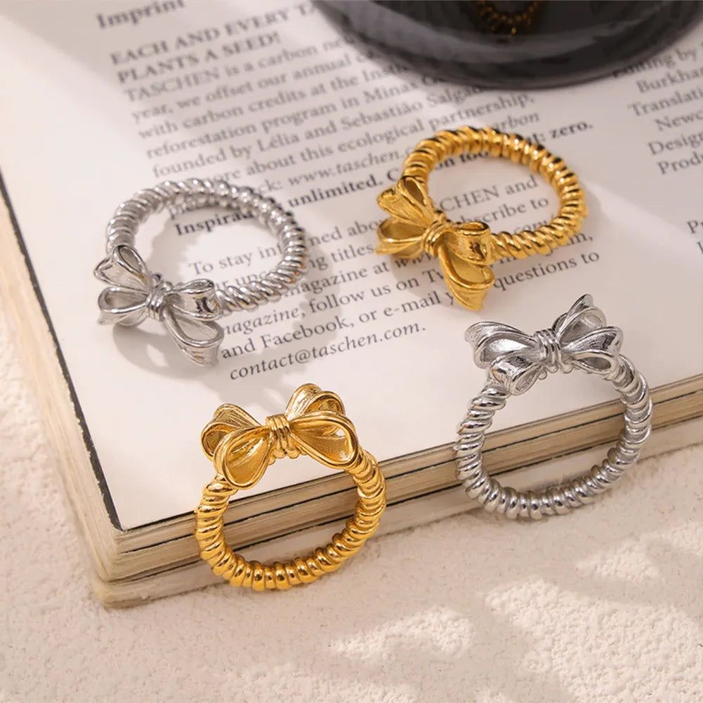 Twisted Titanium Steel Bow Ring in Gold - women's ring