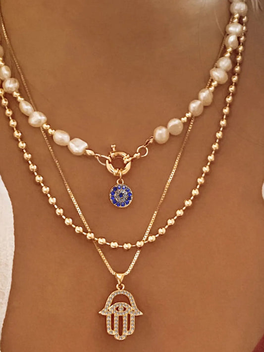 Layered Pearl Chain Evil Eye Hamsa Pendant Necklace in Gold - women's pendant necklace