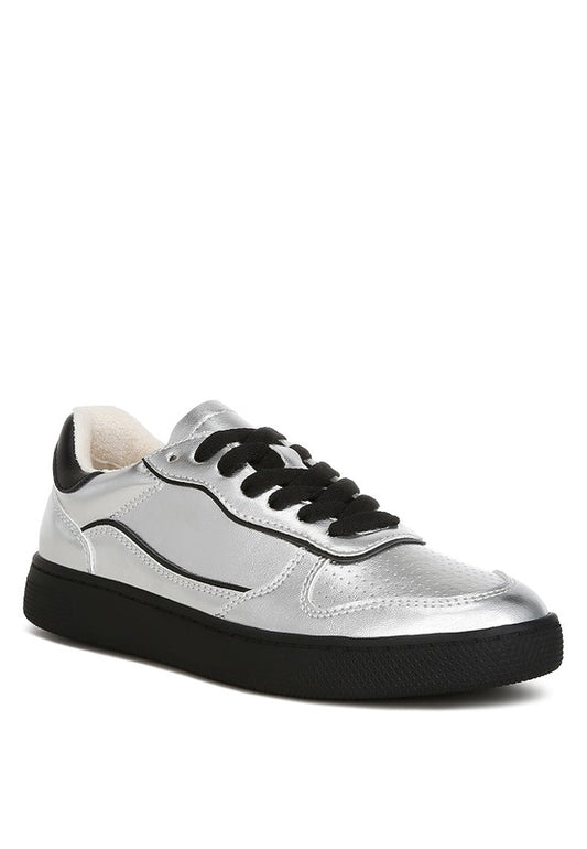 Introducing our Metallic Everyday Sneakers, designed with a durable TPR sole and comfortable cushion insole. These lace-up sneakers feature a stylish contrasting back panel, closed round toe, and flat heels, making them perfect for any casual outing. Crafted from metallic faux leather, they add a touch of shine to your look! Free shipping on all orders. Shop now!
