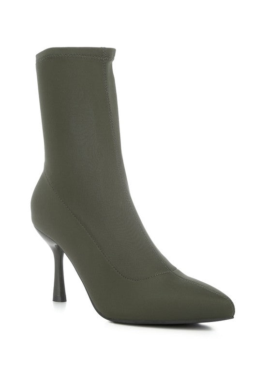 Mid Heel Sock Boots made from Lycra Stretch with a closed almond toe and elasticated sock ankle. Features light cushion insoles for comfort and a TPR outer sole for durability. The low stiletto heel adds sophistication. Slip-on design for easy wear. Free shipping on all orders. Shop now!