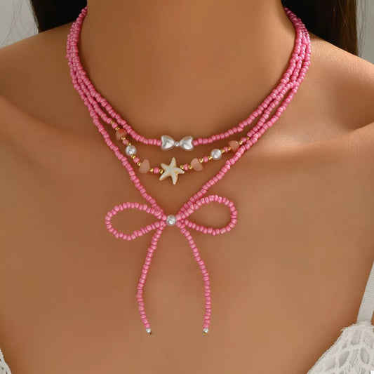 Beaded Three-Layered Necklace with Bow and Starfish Charms - alternate necklace view