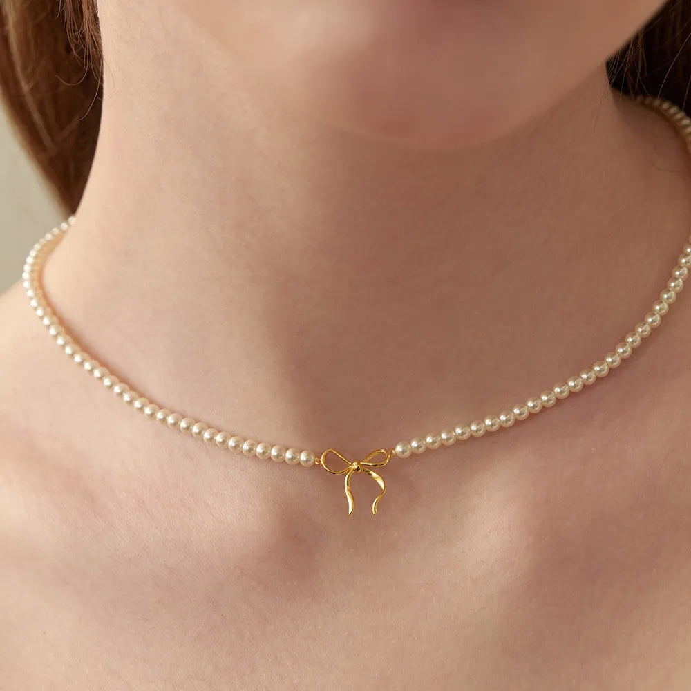 Copper Pearls Bow Necklace in Gold - women's necklace