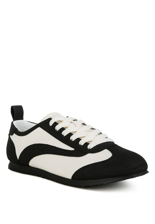 Introducing our Contrast Lace Up Sneakers, expertly crafted from durable faux leather with a TPR outer sole. These sneakers feature a flat heel and closed round toe for ultimate comfort. The stylish lace-up design and paneling details add a fashionable touch, while the convenient pull tabs make them easy to slip on and off. Elevate your casual footwear collection with these must-have sneakers! Free shipping on all orders. Shop now!