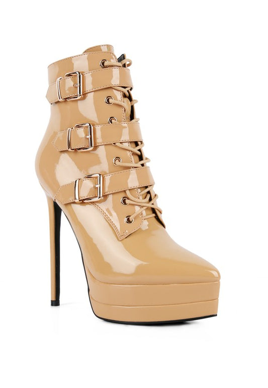 Ankle Boots with patent PU upper material and synthetic lining. Featuring a closed pointed toe, stiletto heel, and three buckle details with metallic eyelets. The side zipper opening adds functionality to these stylish lace-up boots. Free shipping on all orders. Shop now!