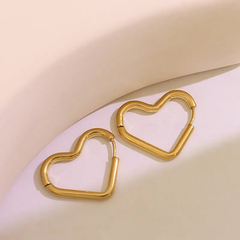 Titanium Steel Geometric Huggie Earrings in Gold Star - women's huggie earrings