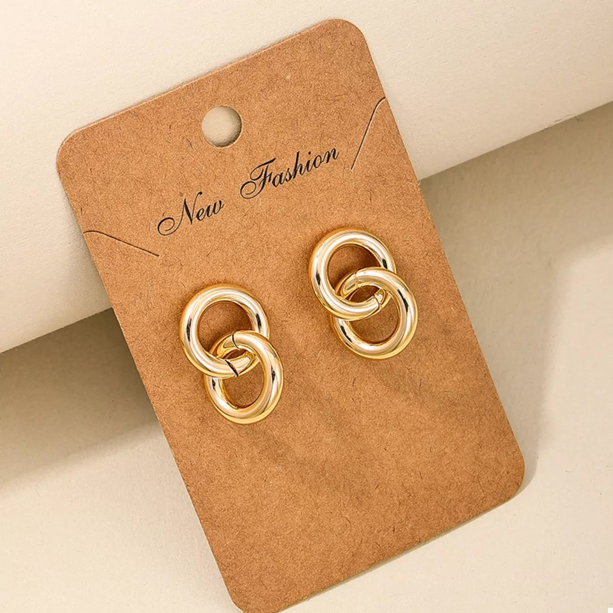 Interlocked Chain Link Stud Earrings in Gold - women's stud earrings