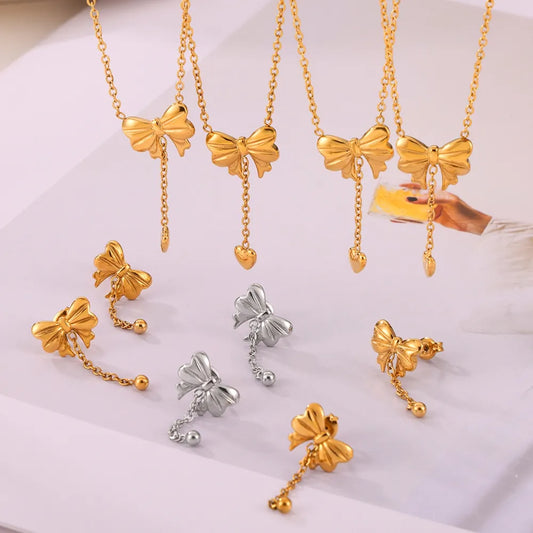 Titanium Steel Bow Earrings in Gold - women's earrings