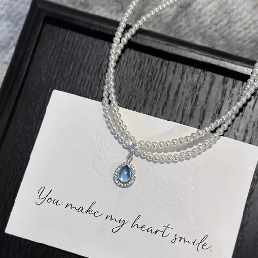 Double Layered Pearl Necklace with Teardrop Pendant in Pastel Blue - women's pendant necklace