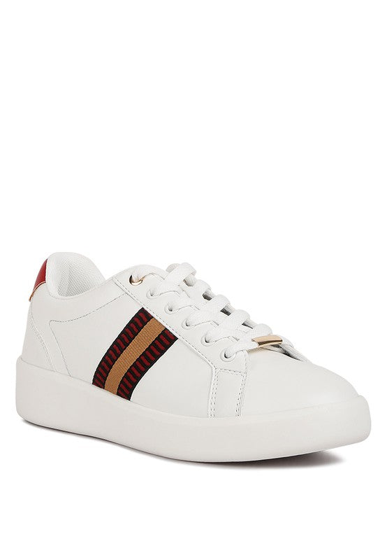 A pair of Loyalty Embroidery Sneakers crafted from smooth faux leather, featuring a closed rounded toe, contrasting back panel, and lace-up detail. The durable rubber outer sole ensures long-lasting wear, while the lightly cushioned insoles provide comfort. The chunky platform design offers height and stability, making these sneakers perfect for stylish, everyday wear. Free shipping on all orders. Shop now!