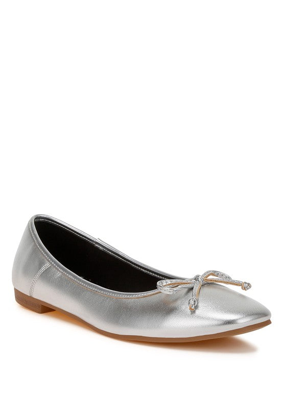 Metallic Pleather Ballerinas with comfortable cushion insoles, slip-on closure, and a closed round toe. Featuring flat heels for all-day comfort and a bow embellishment for added elegance. Perfect for any occasion, these ballerinas are a must-have addition to your shoe collection. Free shipping on all orders. Shop now!