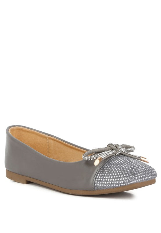 Rhinestones Toe Ballerinas with a faux leather upper, adorned with rhinestone embellishments. The design includes a closed rounded toe, lightly cushioned insole, and a TPR outer sole for all-day comfort and support. Ideal for adding a touch of elegance to any outfit.