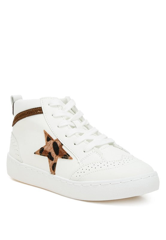 Star high ankle sneakers featuring a metallic faux leather upper with a lace-up design, comfortable cushion insoles, and pull tabs for easy wear. These sneakers have a 1-inch heel for a subtle lift, star patchwork detailing, and perforated sections for breathability. Stylish and comfortable for casual outings. Free shipping on all orders. Shop now!