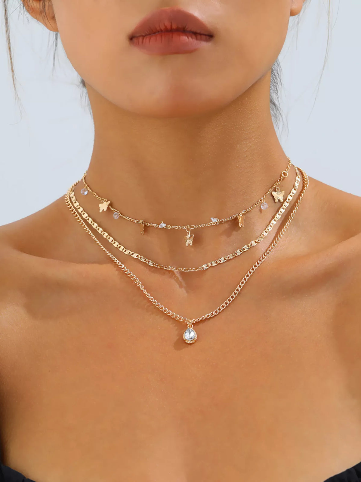 Layered Alloy Necklace with Butterfly and Zircon Charms - alternate necklace view