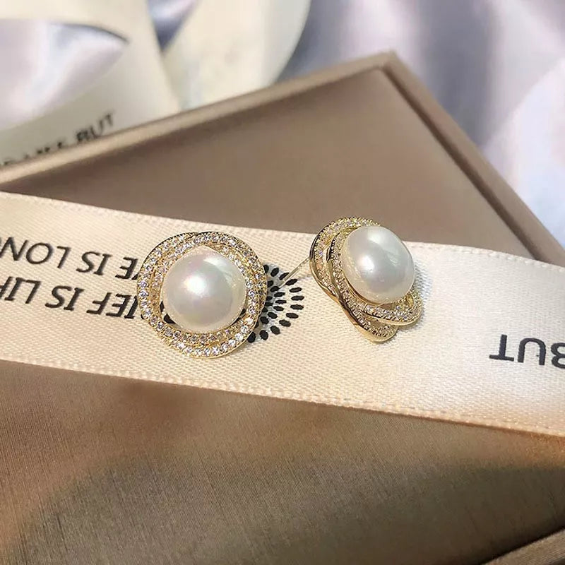 Pearl Stud Earrings in Gold - women's stud earrings