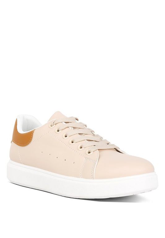 Durable faux leather sneakers with a comfortable fit and stylish lace-up detailing. Features light cushion insoles for support, a contrasting back panel for an edgy touch, closed round toe, and flatform sole. Free shipping on all orders. Shop now!